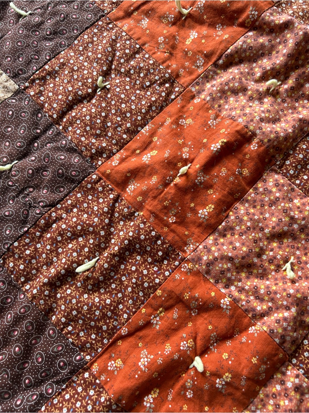 Handmade vintage. Rust & Brown Floral Patchwork Quilt
